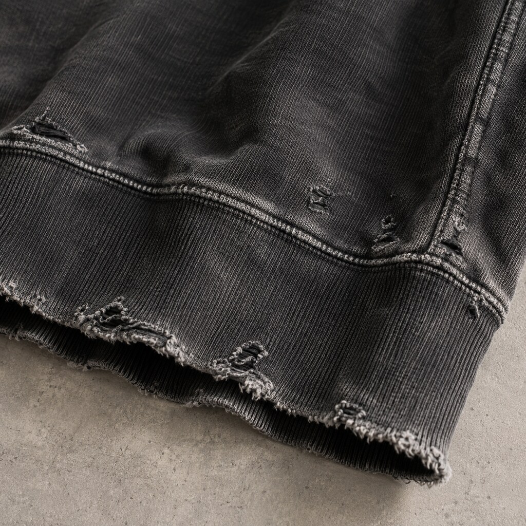 Controlled distressed finishing on custom streetwear sweatshirt